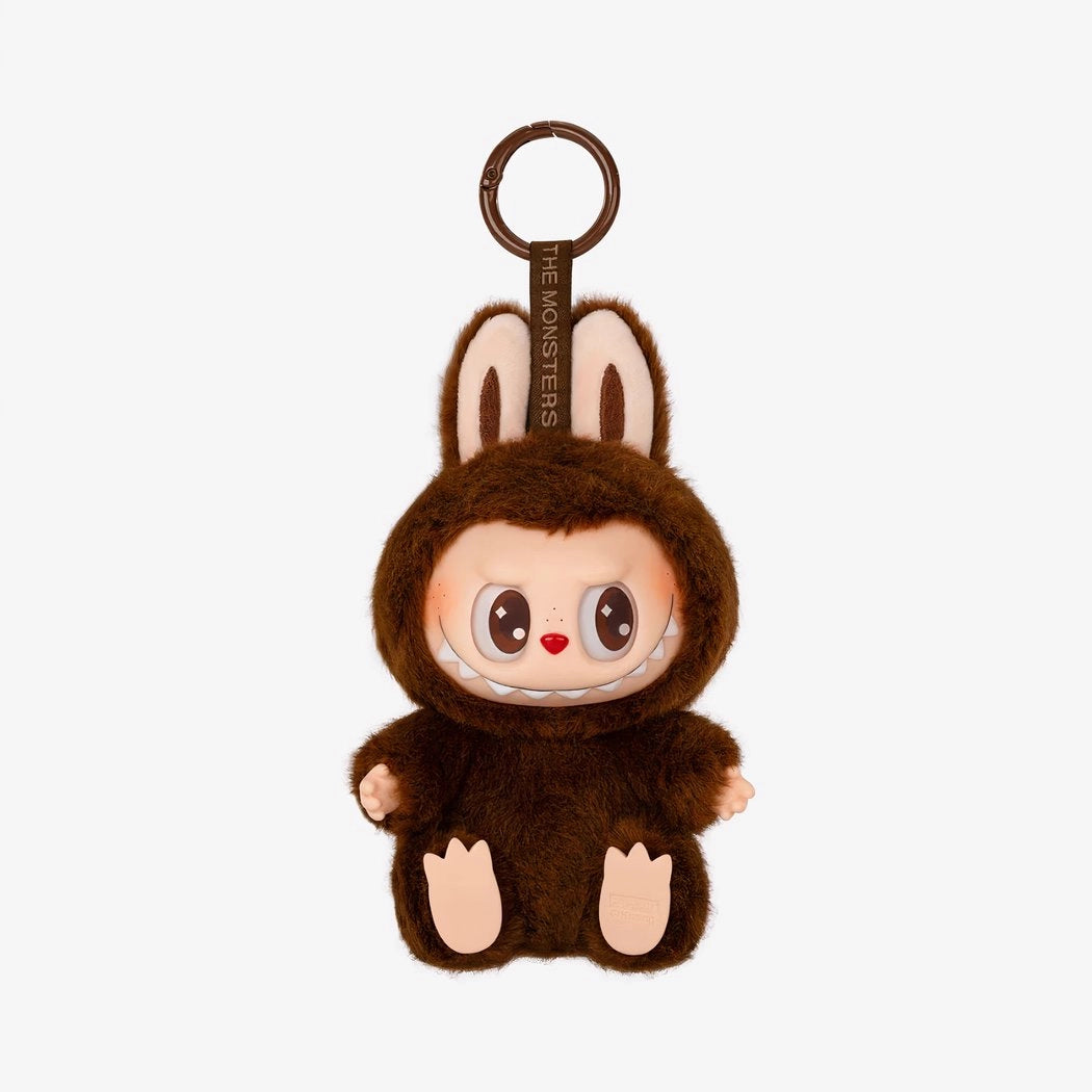 Peluche type Labubu assise boîte mystère