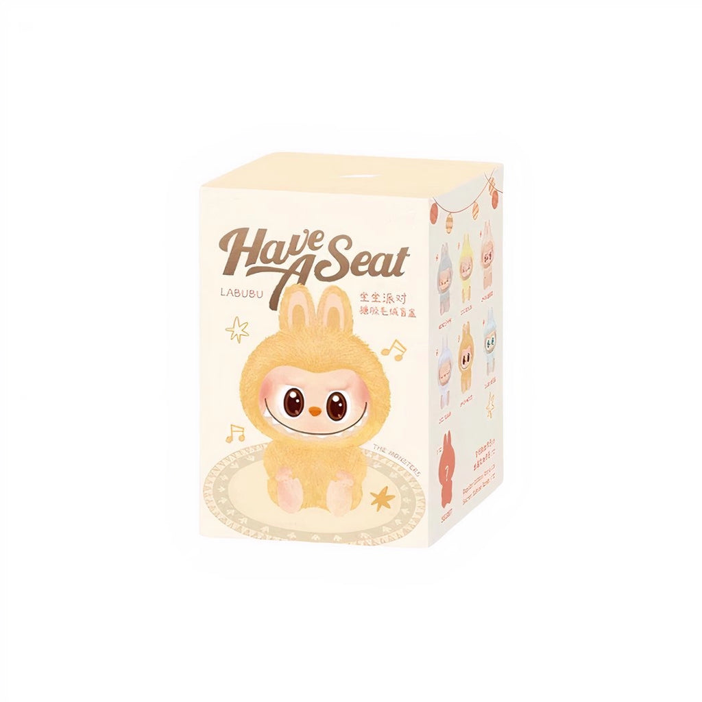 Peluche type Labubu assise boîte mystère