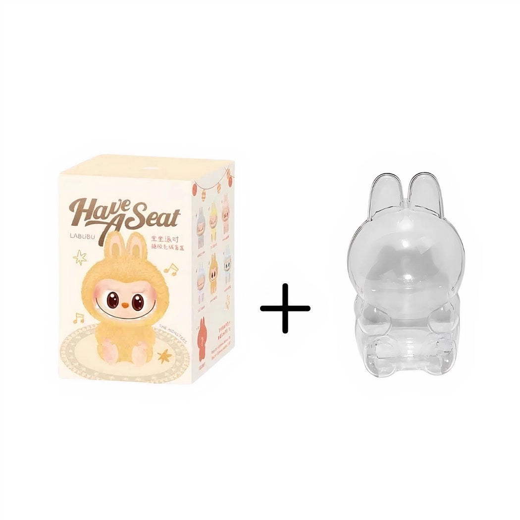 Peluche type Labubu assise boîte mystère