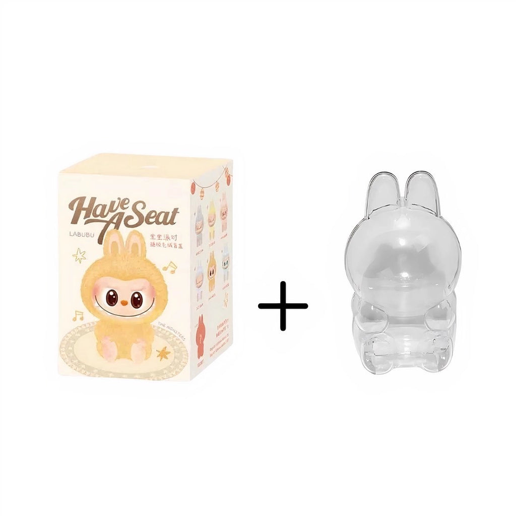 Peluche type Labubu assise boîte mystère