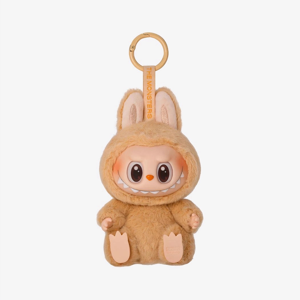 Peluche type Labubu assise boîte mystère