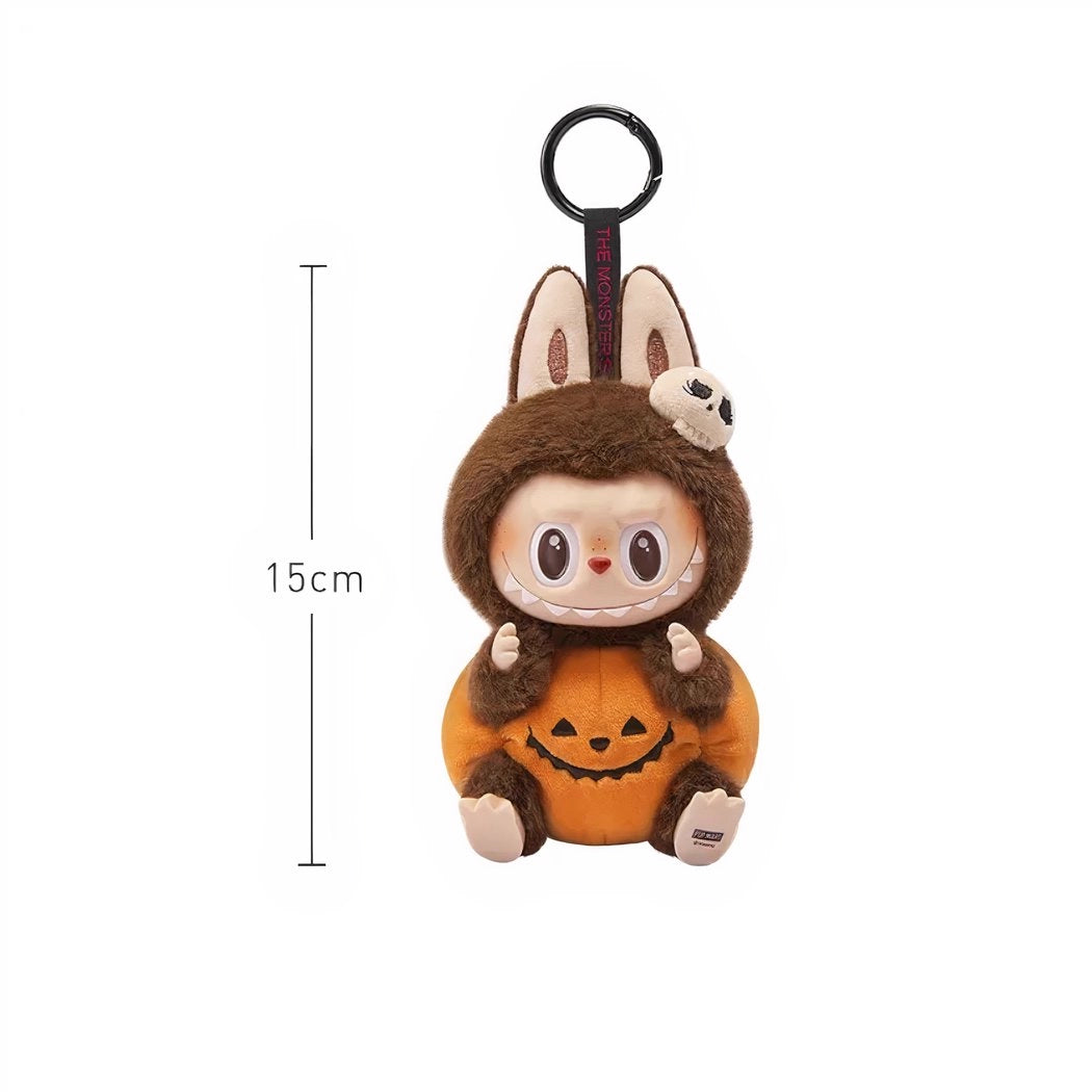 Peluche type Labubu marron et citrouille
