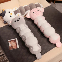 Peluche vache longue à câlins