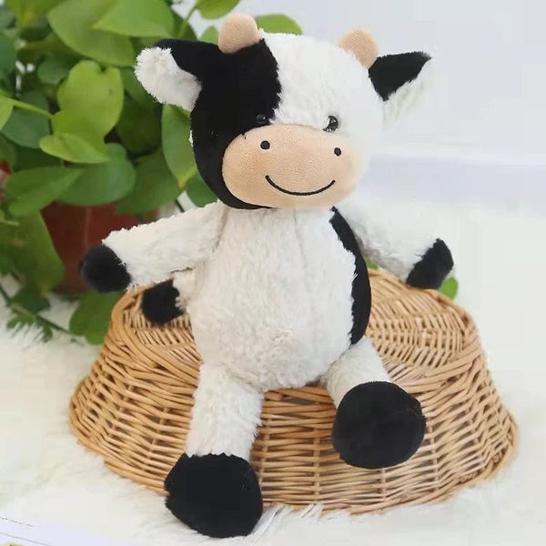 Peluche vache mignonne à fourrure blanche