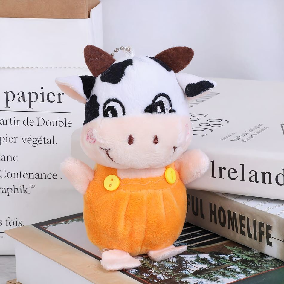 Peluche vache porte-clés mignonne douce cadeau original orange La compagnie de la peluche