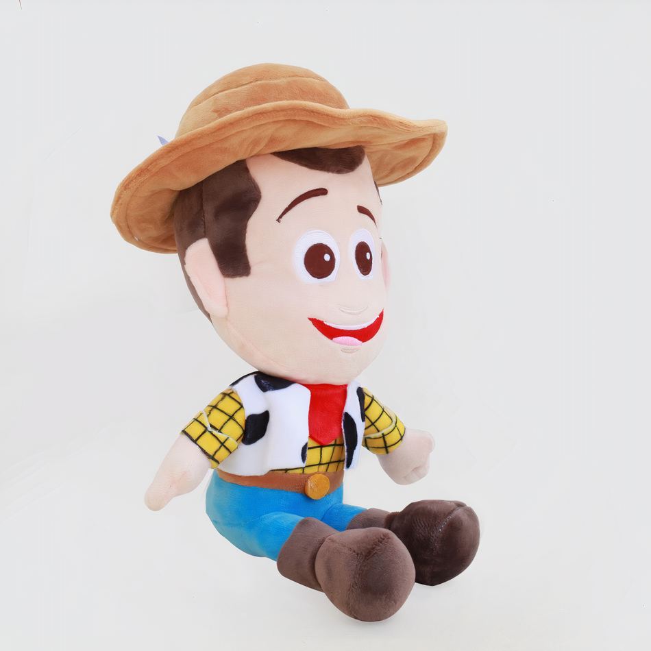 Peluche Woody cowboy doux enfant aventure Pixar La compagnie de la peluche